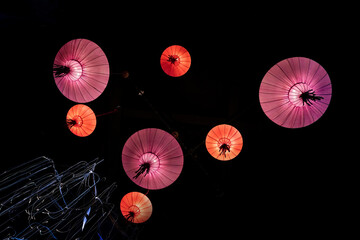 Red lanterns are hanging in the sky
