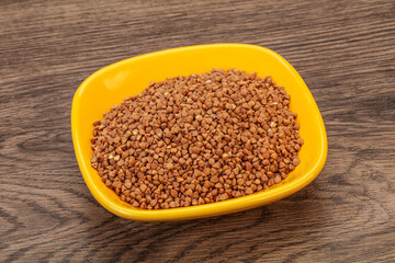 Raw buсkwheat cereal in the bowl