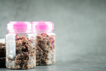 Sweet and sour candy made from tamarind paste and coated by sugar.