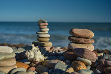 pyramid of stones with sea view