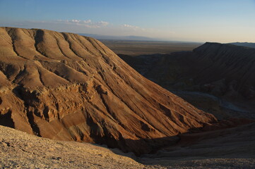 Almaty, Kazakhstan - 06.24.2013 : A rocky sand hill with a bright color transition in Altyn Emel Park