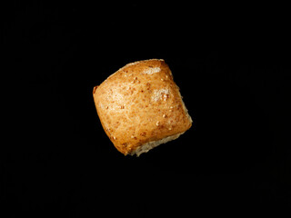 bread on a black background