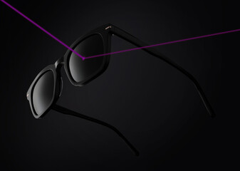 concept of lenses that protect from ultraviolet rays, sunglasses isolated on black background...