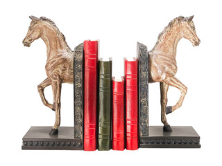 books and bookends in a shape of horses on white background