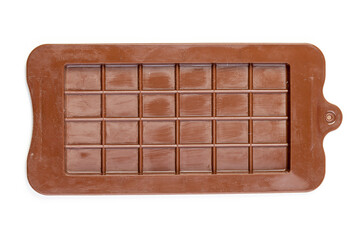 
Brown silicone mold for chocolate in a chocolate bar on a white background.