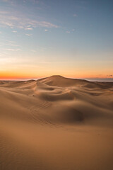 Obraz na płótnie Canvas abu dhabi desert sunset