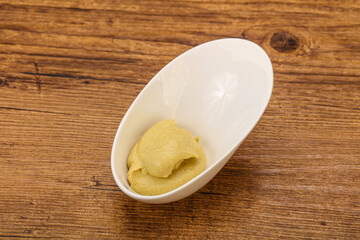 Dijon mustard sauce in the bowl