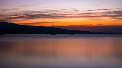 Fototapeta na wymiar Amazing view of sunrise at Tbilisi sea, long exposure