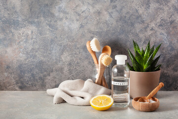 zero waste eco friendly cleaning concept. wooden brushes, lemon, baking soda, vinegar