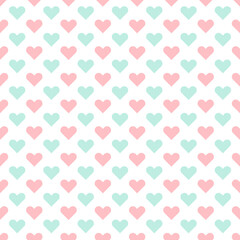 Seamless pattern with colorful hearts on a white background. Vector graphics.