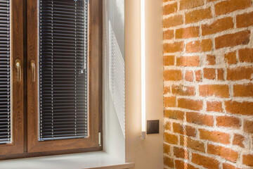 brown window with black blinds, loft, brick wall, industrial interior