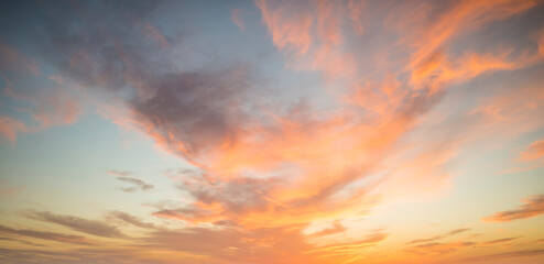 Fototapeta premium Stunning view of a dramatic sky with clouds at sunset. Natural background, wallpaper or preset with copy space.