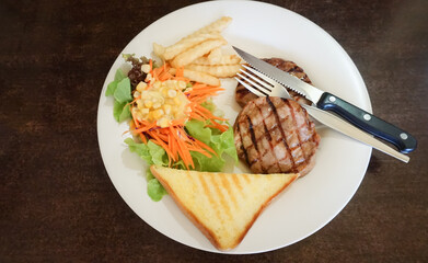 Steak with knife and fork