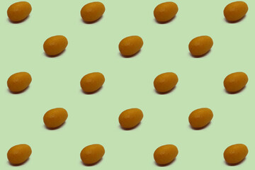 Kumquat fruits on isokated green background