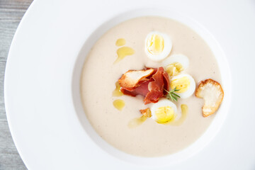 Mushroom soup with egg and bacon