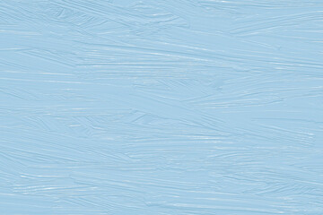 Abstract light blue winter background, rough brush strokes on canvas, drawing surface. Smeared oil paint on the wall. Paper template of pastel colors. Cold tint of backgrounds, texture pattern.