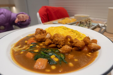 Delicious rice with curry and egg