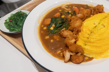 Delicious rice with curry and egg