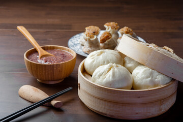 Chinese breakfast. Steamed buns and porridge are on the table
