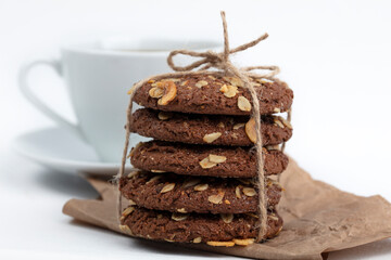 delicious cookies and a cup of coffee. Isolated on white background