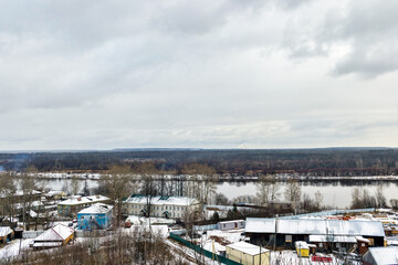 Fototapeta na wymiar outskirts of a russian city on a gloomy winter day