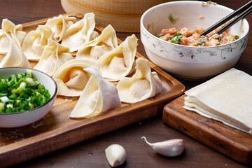 The chef is making meat wonton