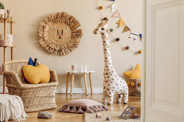 Stylish scandinavian interior of child room with natural toys, hanging decoration, design...