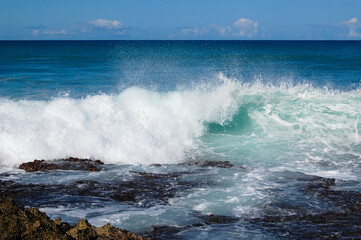 Splash of ocean waves in North Shore, Oahu, Hawaii
