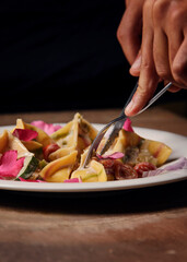.Fresh homemade ravioli on the plate