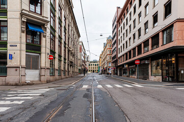 Fototapeta na wymiar July 26, 2013. View of the streets of Oslo, Norway. Area of the center of Oslo. Tram tracks and pedestrian crossings on the street. Editorial