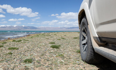 Off road car on the lakeside