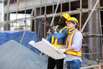 Professional Construction and  Engineer team Working on workplace. Professional black architect and...