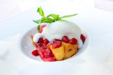 French toast grilled  strawberries and ice cream on top