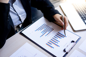 Female finance staff , Business women working at home, typing on keyboards, typing company profit...