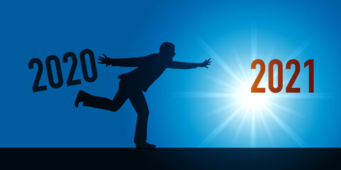 Carte de vœux 2021 montrant un homme en contre jour, qui court pour quitter l’année 2020 dans l’espoir d’une meilleur année.