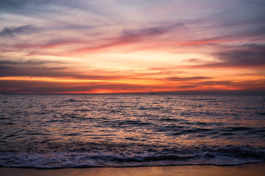Tropical sea wave and colorful sky at the sunset - Powered by Adobe