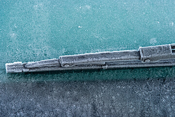 closeup of a windshield wipers on a blue background