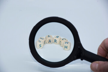 search with a loupe or magnifying glass