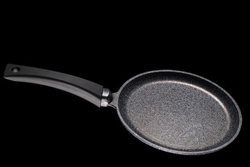 Grey frying pan with non-stick, isolated on black background