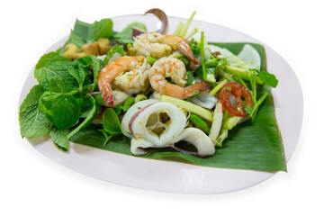 Spicy Seafood Salad with Squid and Shrimp, focus selective.