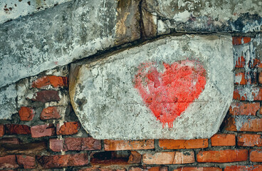 Graffiti heart on an old brick wall