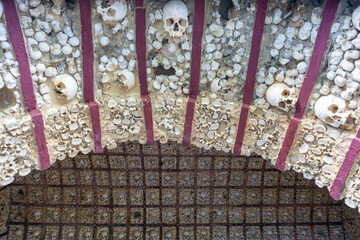 skulls and bones up close in the Chapel of Bones in Faro