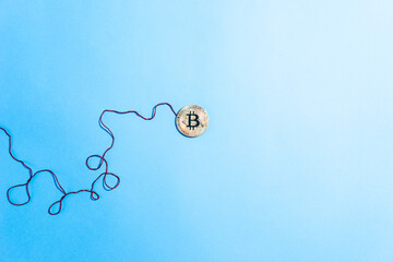 cryptocurrency bitcoin coin  on blue background.