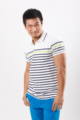Fototapeta premium A young man in casual wear holding a trophy 