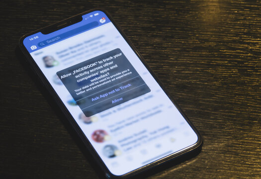 AACHEN, GERMANY - 05. January 2021 : Apple IPhone Facebook App Request Permission From Users To Track Their Activity Across Other Apps And Websites For Personalized