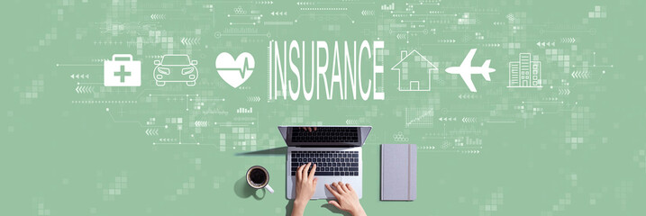 Insurance concept with person working with a laptop