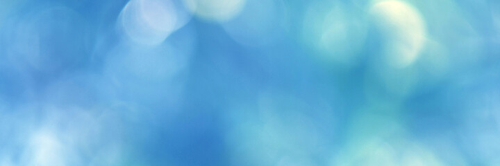 Fototapeta premium Light blue Leaf background. Blurred leaves and circular bokeh. Abstract for design and wallpaper.