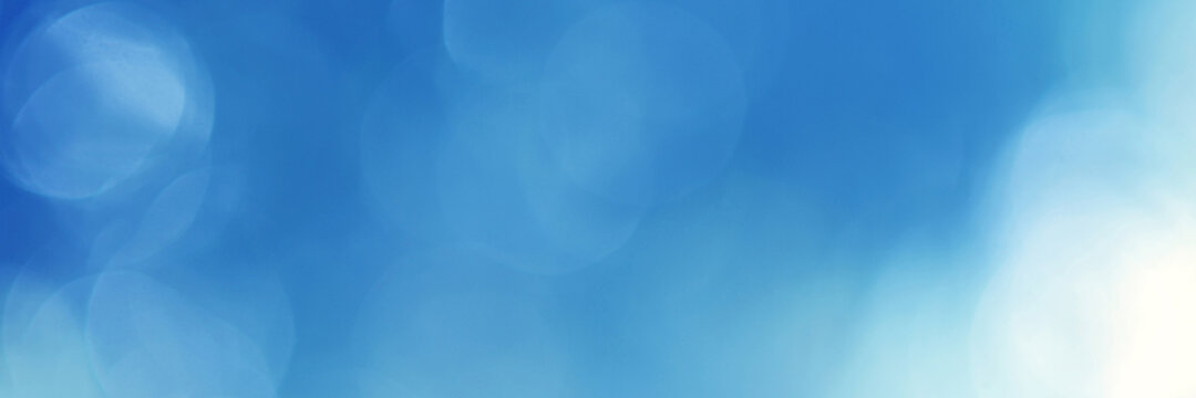 Light blue Leaf background. Blurred leaves and circular bokeh. Abstract for design and wallpaper.