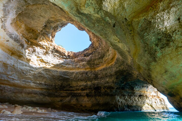 view of the inside of the Benagil Cave on the Algarve coast of Portugal