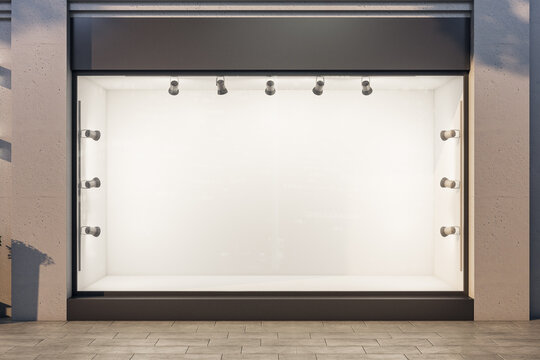 Side view of shop with empty glass showcase.